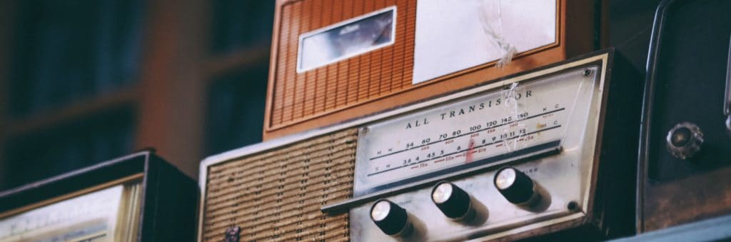 Old Vintage Music Radios On A Shelf