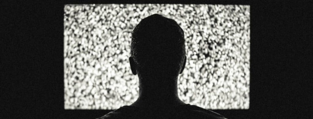 The Dramatic Stages of Tension: How to Create Conflict for your Audience 8 Silhouette of Man in Front of Tv