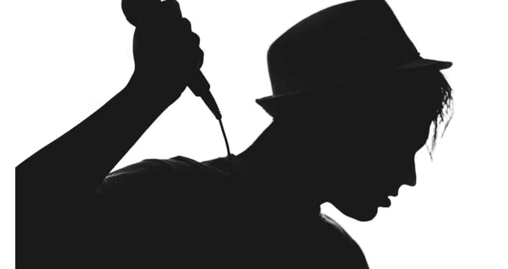 Singer Silhouette on White Background