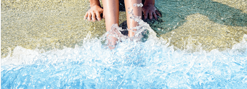 Sound of Feet washed in ocean wave