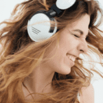 Copyright for Musicians: Who Owns the Copyright for A Song? 11 Woman Listening Music
