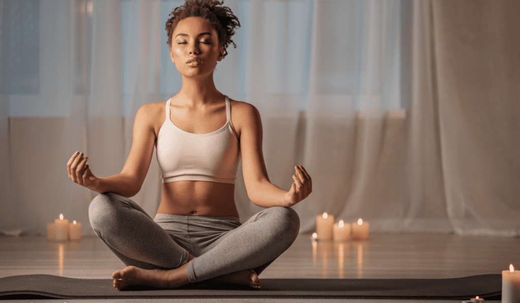Calm young woman meditating in peaceful atmosphere