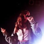 woman singing on focus photo