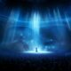 thorstenmeyer Create an image of a dimly lit concert hall bathe 00350e2f a89e 4236 abbe 768469f2a95c IP384886 1